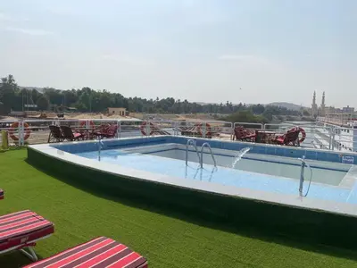 a large swimming pool on a cruise ship at nile crouse in Luxor