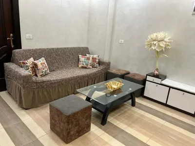 a living room with a couch and a table at flat in Hurghada Sheraton Street in Hurghada