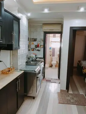 a kitchen with a sink and a stove in it at flat in Hurghada Sheraton Street in Hurghada