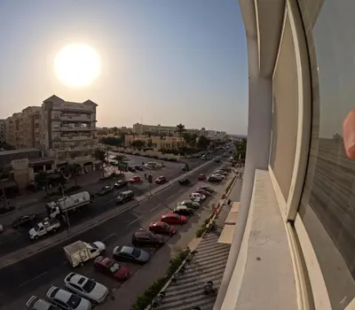 a view of a city street from a building at Sea La Vie Furnteched, Central, Beach Front, Free WIFI in Hurghada