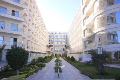 a walkway in the middle of a building at Sea La Vie Furnteched, Central, Beach Front, Free WIFI in Hurghada