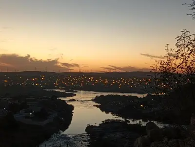 a view of a river at sunset at noreno house in Shellal