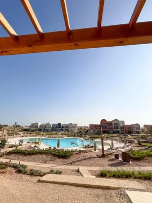a view of a swimming pool at a resort at EL GOUNA Boho Beach Chalet with pool access in Hurghada
