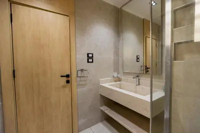 a bathroom with a sink and a mirror at private villa in Hurghada