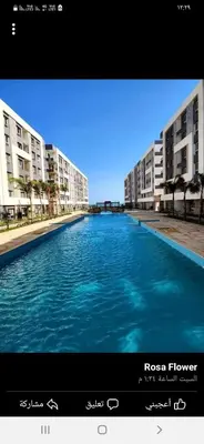 a large pool of blue water in front of buildings at الغردقه in Hurghada