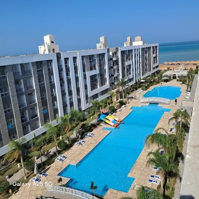 an aerial view of a resort with a pool at الغردقه in Hurghada
