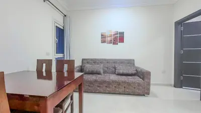 a living room with a couch and a table at La Quinta Beach Resort in Hurghada in Hurghada