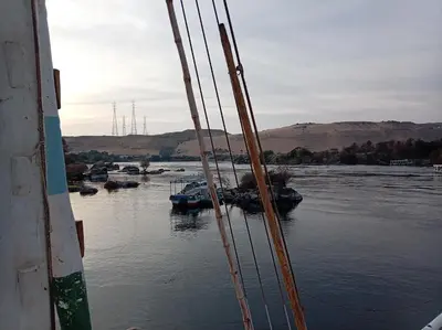a view of a river with boats in the water at Nile Dream Yacht in Jazīrat Salūjah