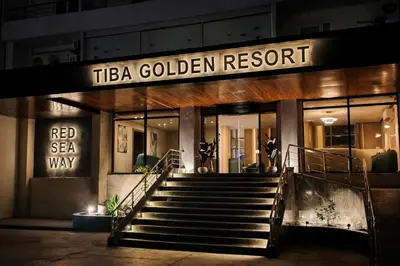 a building with a sign that reads tica golden resort at Tiba Golden in Hurghada