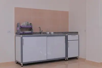 a kitchen with a counter top and a sink at sunrise house in Luxor