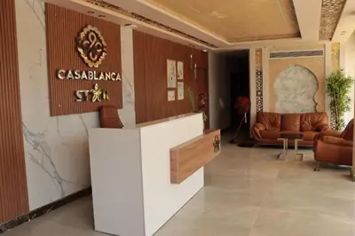 a lobby of a building with a sign on the wall at Seaside studio with private Beach and pool in Hurghada