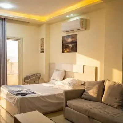 Seaside studio with private Beach and pool