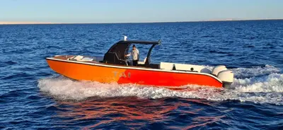 a man in a boat on the water at TaiTours in Hurghada