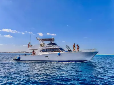 a group of people on a boat in the water at TaiTours in Hurghada