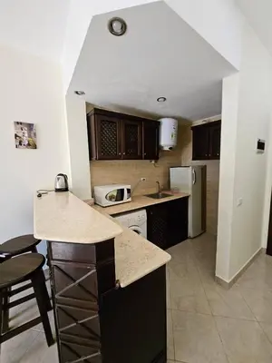 a kitchen with a sink and a counter top at Sea-View apartment in El Andalous in Hurghada