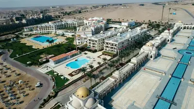 an aerial view of a resort with a pool at Palm Beach Piazza Apart hotel Sahl Hasheesh Hurghada in Hurghada