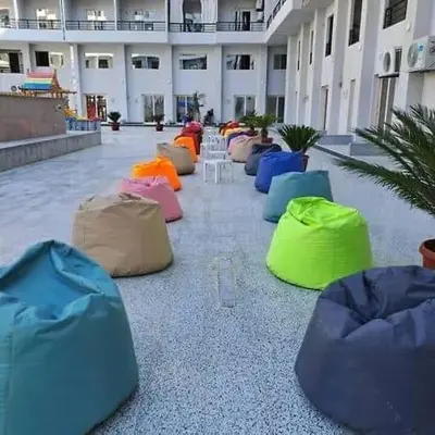 a group of bags on the floor of a building at Tiba golden resort in Hurghada