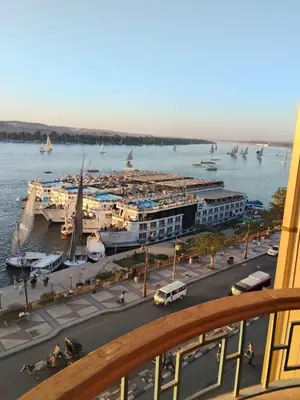 a view of a marina with a harbor and boats at شقة بمول اسوان بلازا- اسوان in Aswān