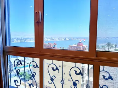 a view of the ocean from a window at Sun Palace House in Luxor