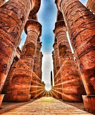 a view from the center of an old building with columns at Labib Guest house in Aswan