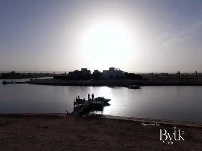 a group of people standing on a boat in the water at BYTK - La Serena in Hurghada
