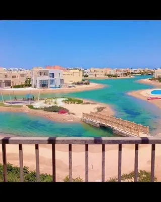 a view of the beach from a balcony at Hayloft 1 bedroom tawila, Plaza ElGouna in Hurghada