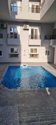 a large swimming pool in front of a building at La Bellal Star Hurghada A103 in Hurghada