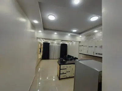an office with a desk in a room with lights at الاقصر in Luxor