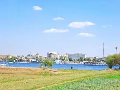 a view of a river with a city in the background at Villa malaika with Private swimming pool in Luxor