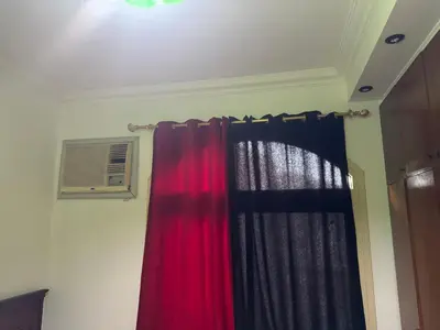 a room with a curtain and a window at apartment 20 in Hurghada