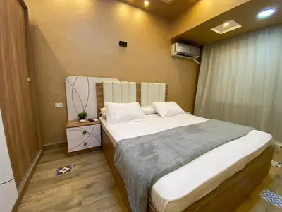 a bedroom with a large bed in a room at Star Beach in Hurghada