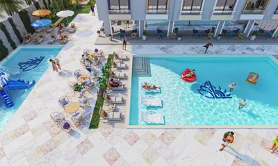 an overhead view of a pool at a resort at فلورينزا in Hurghada