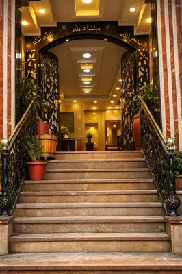 a set of stairs in a building with a lobby at Star Luka Private Hotel Room in Luxor