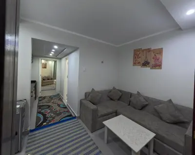 a living room with a couch and a table at Scandic Resort in Hurghada