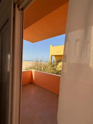 an open door to a balcony with a view at Stunning Pool and Sea View Villa, Al Dora Resort, Hurghada in Hurghada