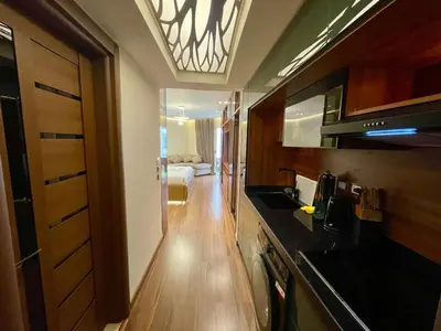 a room with a kitchen and a living room at Luxury Studio in Hurgada Egypt in Hurghada