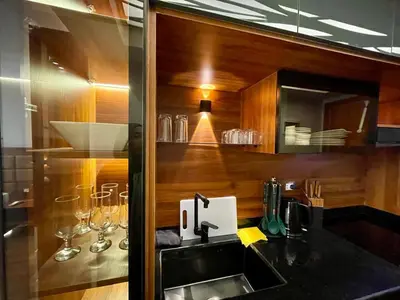 a kitchen with a sink and wine glasses at Luxury Studio in Hurgada Egypt in Hurghada