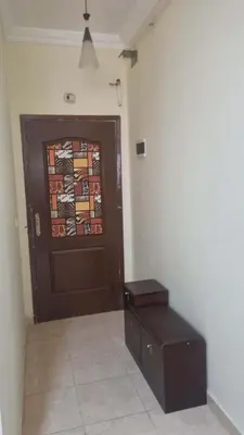 a room with a door with a stool in front of it at Barbara Hurghada in Hurghada