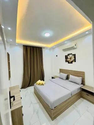 a bedroom with a bed in a room at villa sky in Hurghada