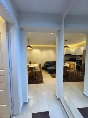 a view of a living room and dining room at Karma in Hurghada