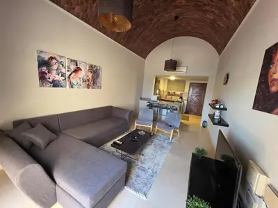 a living room with a couch and a table at Blue haven el gouna in Hurghada