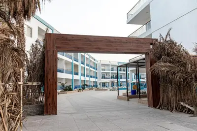 an entrance to a building with a wooden gate at Mirage Bay Resort Hurghada B-780 in Hurghada