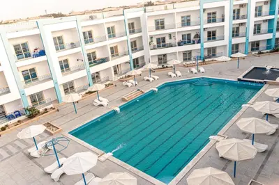 an overhead view of a swimming pool at a hotel at Mirage Bay Resort Hurghada B-794 in Hurghada