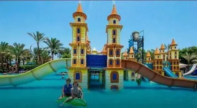 a water park with a slide in the water at Mirage Bay Resort Hurghada B-794 in Hurghada