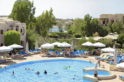 a group of people in a pool at a resort at Three Corners Rihana Resort El Gouna in Hurghada