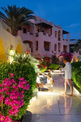 a group of people standing in front of a building at Three Corners Rihana Resort El Gouna in Hurghada