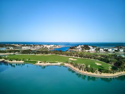 an aerial view of a golf course on the water at Steigenberger Golf Resort El Gouna in Hurghada