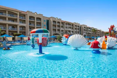 a water park at a resort with a water slide at Pickalbatros White Beach Resort - Hurghada in Hurghada