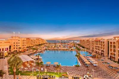 an aerial view of a resort with a swimming pool at Pickalbatros White Beach Resort - Hurghada in Hurghada
