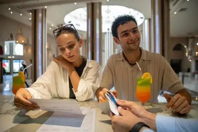 a group of people sitting at a table at Sunny Days Palma De Mirette Resort & Spa in Hurghada